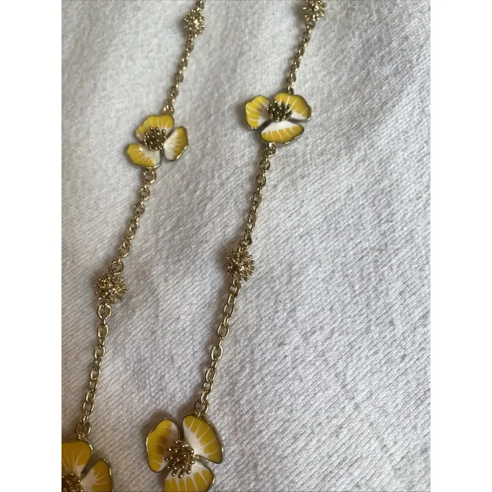 Long Gold Tone Necklace Featuring Yellow Flowers NWOT